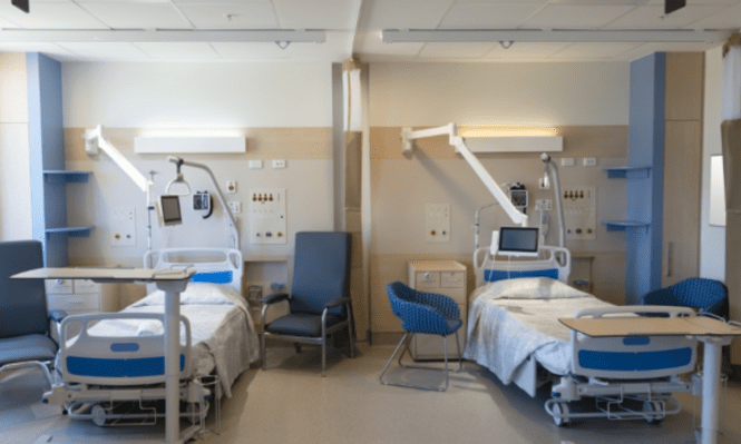 Hospital beds patient handling equipment using locking gas struts