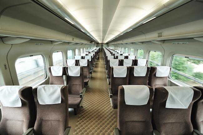 Inside a speed train carriage showcasing the seating interior